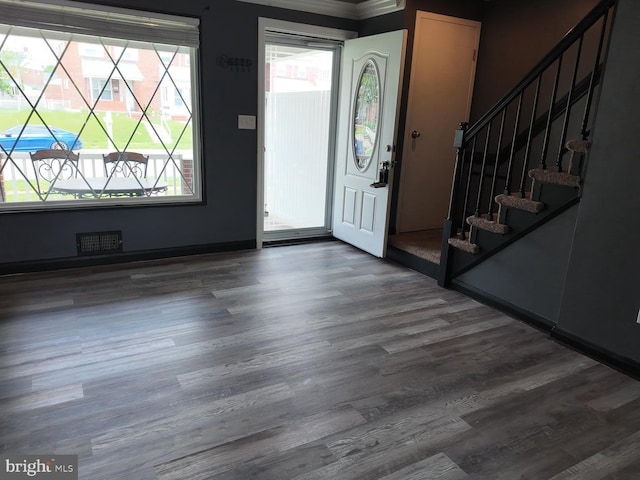 7849 Charlesmont, Dundalk, MD 21222 - foyer featuring wood finished floors, stairs, and baseboards