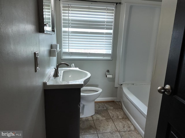 7849 Charlesmont, Dundalk, MD 21222 - bathroom with toilet, vanity, and baseboards