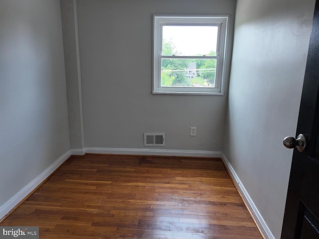 7849 Charlesmont, Dundalk, MD 21222 - unfurnished room with wood finished floors and baseboards