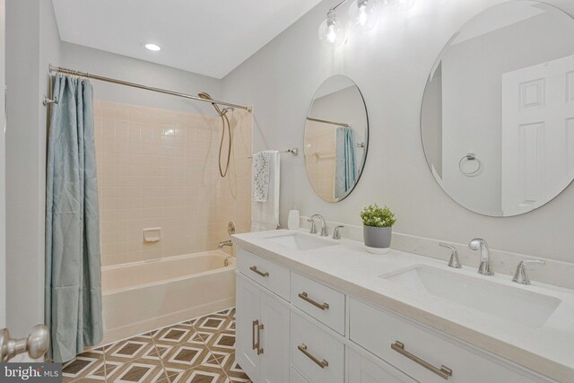 12641 Terrymill Dr, Herndon, VA 20170 - bathroom featuring shower / bath combo with shower curtain, double vanity, and tile patterned flooring