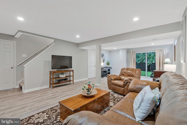 12641 Terrymill Dr, Herndon, VA 20170 - living area featuring light wood-style flooring, stairs, baseboards, and recessed lighting
