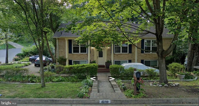4098 Camelot, Dumfries, VA 22026 - bi-level home featuring brick siding and roof with shingles