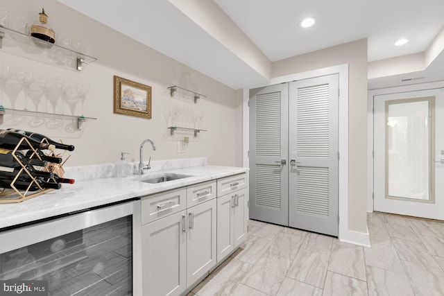 4324 14th St NW Unit 1, Washington, DC 20011 - indoor wet bar featuring wine cooler, light marble finish flooring, recessed lighting, and baseboards