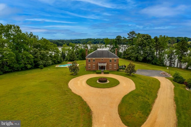 46369 Hattons Rest Ln, Lexington Park, MD 20653 - view of grassy yard with curved driveway, view of wooded area, and a water view