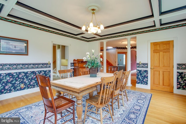 46369 Hattons Rest Ln, Lexington Park, MD 20653 - dining room featuring ornate columns, coffered ceiling, light wood-style floors, a chandelier, and baseboards