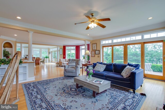 46369 Hattons Rest Ln, Lexington Park, MD 20653 - living area featuring crown molding, a ceiling fan, french doors, light wood-type flooring, and decorative columns
