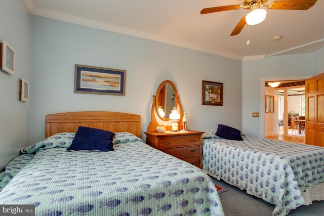 46369 Hattons Rest Ln, Lexington Park, MD 20653 - carpeted bedroom with ornamental molding and a ceiling fan
