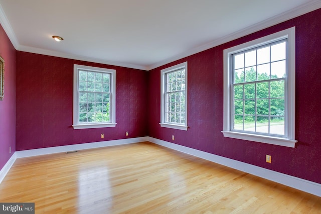 46369 Hattons Rest Ln, Lexington Park, MD 20653 - empty room with healthy amount of natural light, crown molding, light wood finished floors, and baseboards