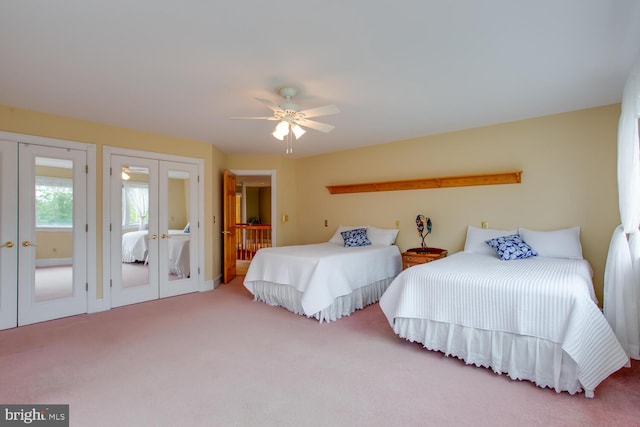 46369 Hattons Rest Ln, Lexington Park, MD 20653 - bedroom featuring french doors, carpet, two closets, and a ceiling fan
