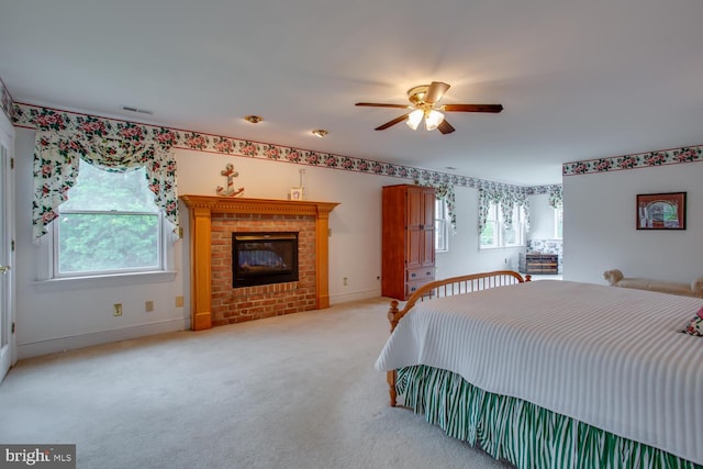46369 Hattons Rest Ln, Lexington Park, MD 20653 - bedroom with a fireplace, light colored carpet, baseboards, and a ceiling fan