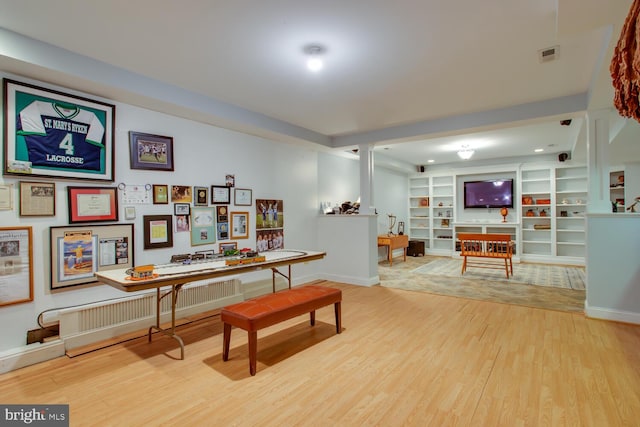 46369 Hattons Rest Ln, Lexington Park, MD 20653 - office area featuring wood finished floors, baseboards, and built in shelves