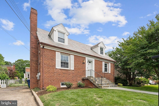 1725 Oakcrest Dr, Alexandria, VA 22302 - cape cod home with brick siding and a chimney