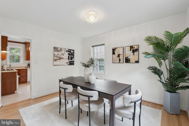 1725 Oakcrest Dr, Alexandria, VA 22302 - dining space with light wood-type flooring and baseboards