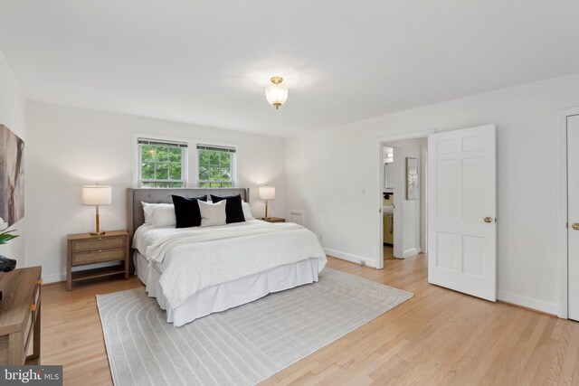 1725 Oakcrest Dr, Alexandria, VA 22302 - bedroom with light wood-type flooring and baseboards
