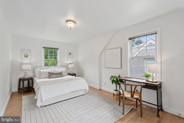 1725 Oakcrest Dr, Alexandria, VA 22302 - bedroom featuring light wood finished floors and baseboards