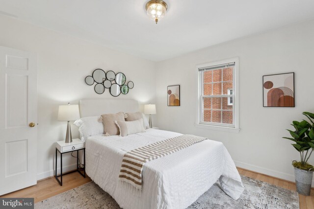 1725 Oakcrest Dr, Alexandria, VA 22302 - bedroom featuring wood finished floors and baseboards