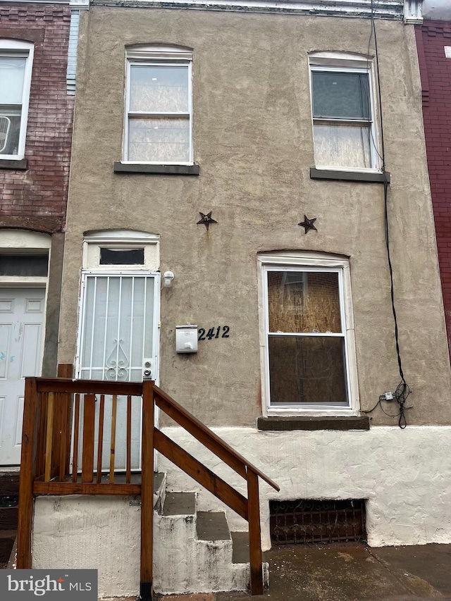 2412 N Corlies St, Philadelphia, PA 19132 - property entrance with stucco siding