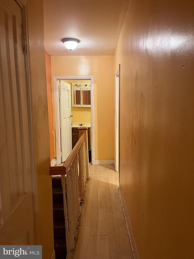 2412 N Corlies St, Philadelphia, PA 19132 - corridor featuring light wood-type flooring and baseboards