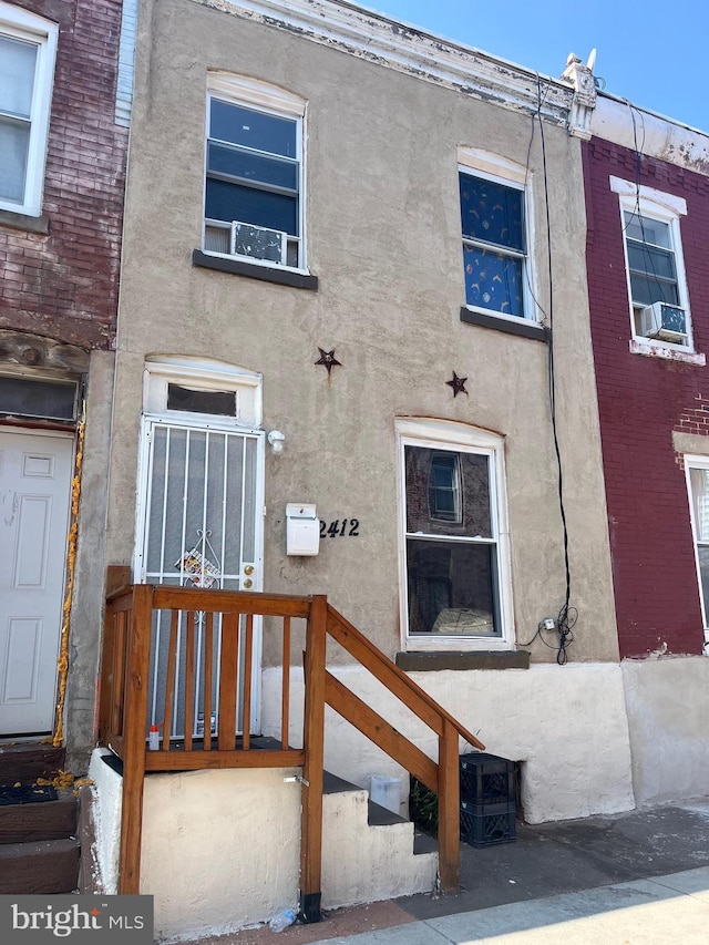 2412 N Corlies St, Philadelphia, PA 19132 - back of property with stucco siding and cooling unit