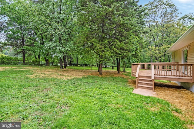 view of yard featuring a deck