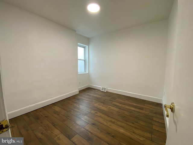 2546 N Marston St, Philadelphia, PA 19132 - unfurnished room featuring baseboards and dark wood-style floors