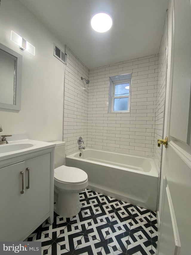 2546 N Marston St, Philadelphia, PA 19132 - full bathroom with toilet, vanity, tub / shower combination, and tile patterned floors