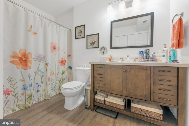 275 Green St Unit 4-I6, Edgewater Park, NJ 08010 - bathroom featuring wood finished floors, toilet, vanity, and a shower with shower curtain