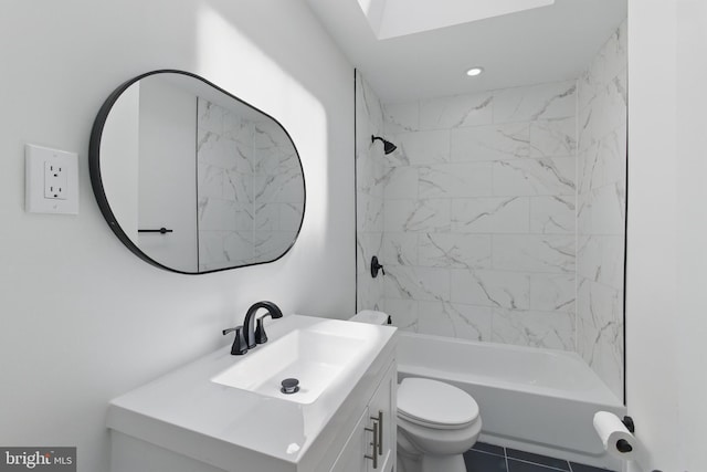 bathroom with vanity, toilet, and shower / bathtub combination