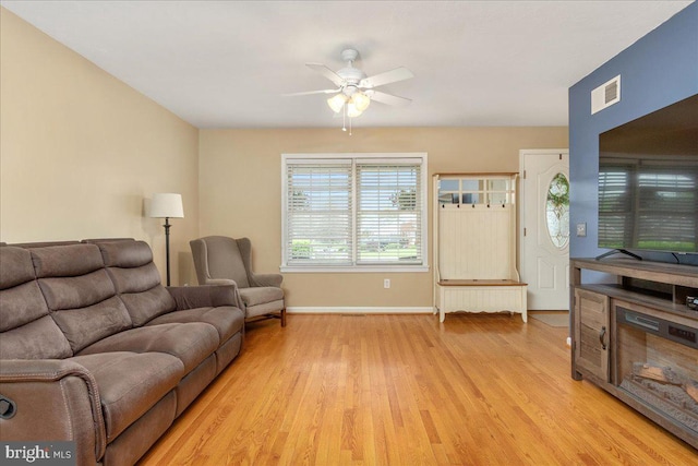192 Antietam Dr, Waynesboro, PA 17268 - living room featuring light wood-type flooring, a ceiling fan, and baseboards