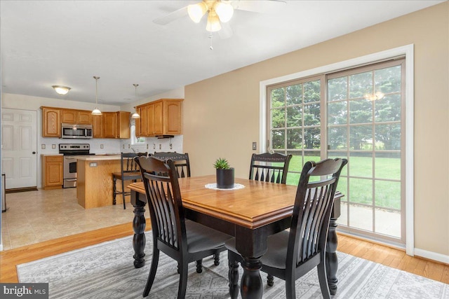 192 Antietam Dr, Waynesboro, PA 17268 - dining area featuring ceiling fan, light wood finished floors, and baseboards