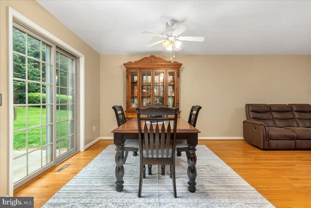 192 Antietam Dr, Waynesboro, PA 17268 - dining room featuring wood finished floors, a ceiling fan, and baseboards