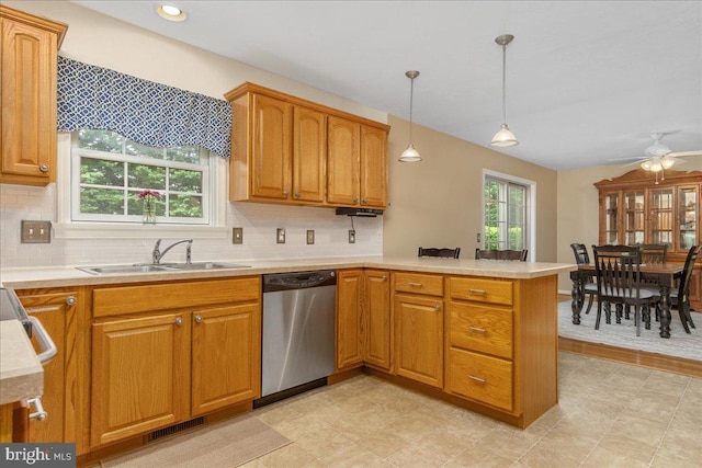 192 Antietam Dr, Waynesboro, PA 17268 - kitchen with dishwasher, a sink, a peninsula, and tasteful backsplash