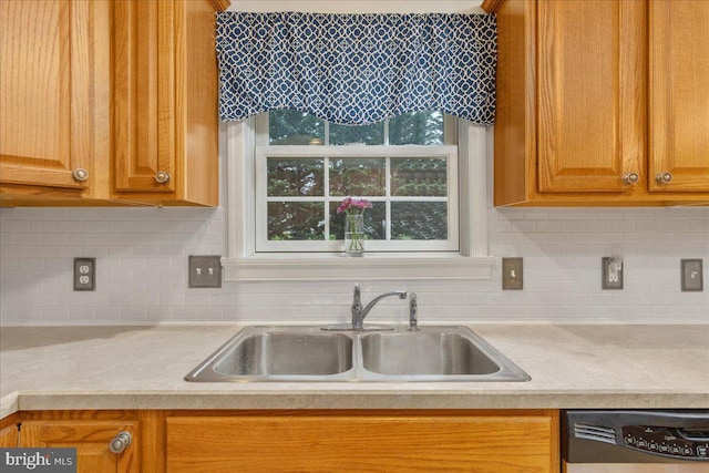 192 Antietam Dr, Waynesboro, PA 17268 - kitchen with a sink, dishwashing machine, light countertops, and backsplash
