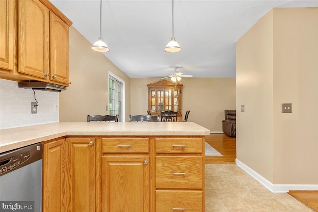 192 Antietam Dr, Waynesboro, PA 17268 - kitchen featuring dishwasher, a peninsula, ceiling fan, tasteful backsplash, and light countertops