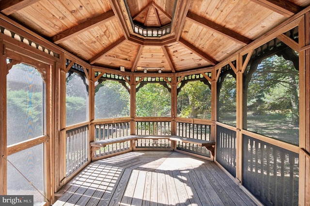 wooden terrace with a sunroom