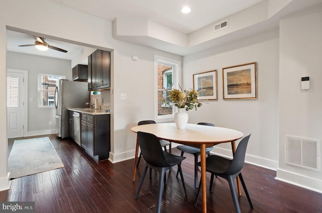 dining area with baseboards, dark wood-type flooring, a ceiling fan, and recessed lighting