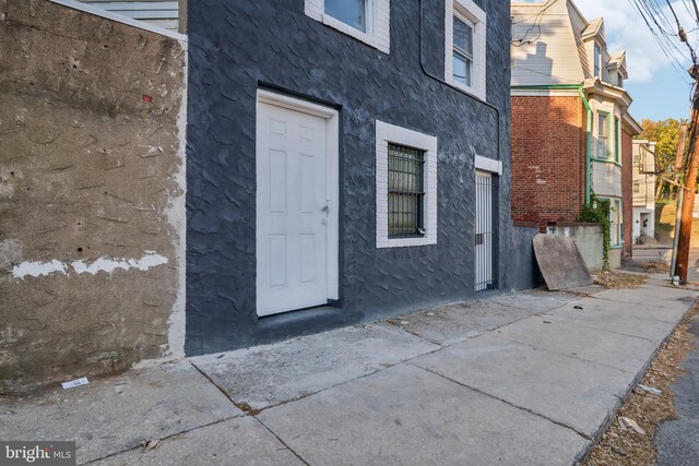 702 Main St, Darby, PA 19023 - view of exterior entry featuring stucco siding