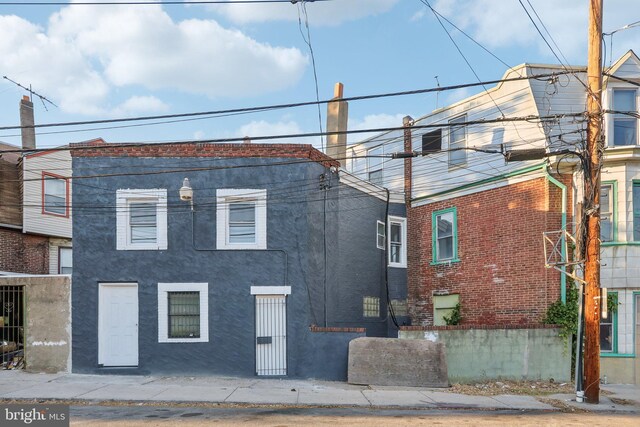 702 Main St, Darby, PA 19023 - view of front facade featuring brick siding