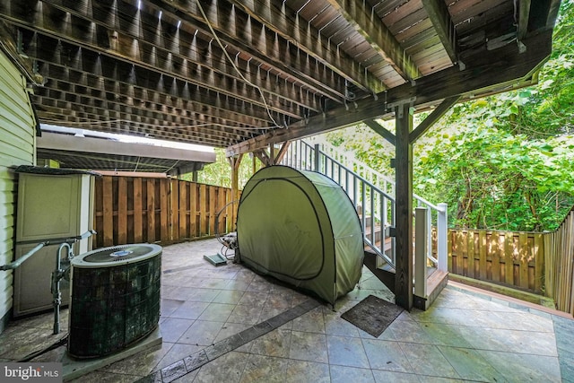 5948 Edgehill Ct, Alexandria, VA 22303 - view of patio / terrace featuring stairs, a fenced backyard, and central air condition unit