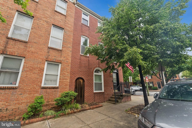 800 S Charles St, Baltimore, MD 21230 - view of side of home with brick siding