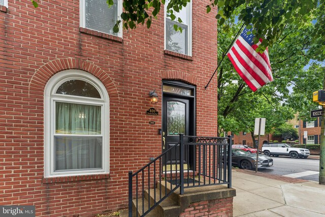 800 S Charles St, Baltimore, MD 21230 - doorway to property with brick siding