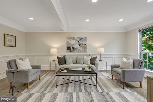 21850 Goldstone Ter, Sterling, VA 20164 - living area featuring ornamental molding, a decorative wall, light wood finished floors, recessed lighting, and wainscoting