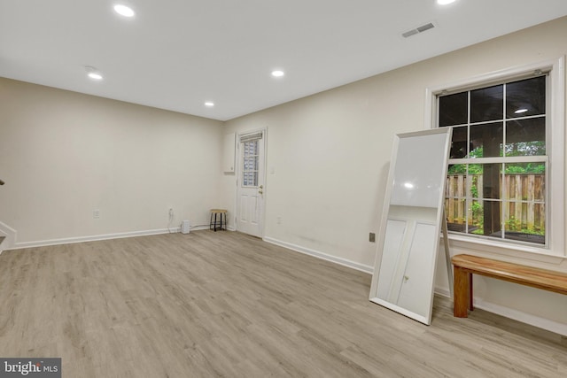 21850 Goldstone Ter, Sterling, VA 20164 - unfurnished room with wood finished floors, baseboards, and recessed lighting