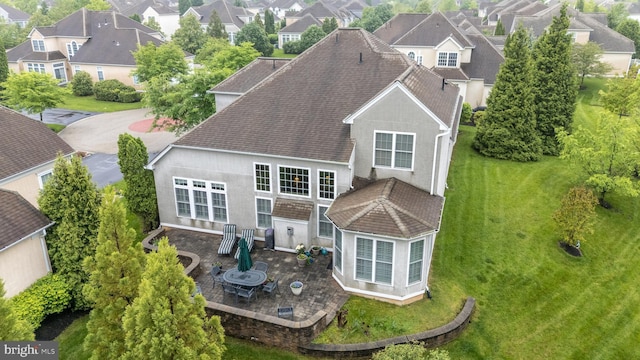 267 Goldenrod Dr, Upper Gwynedd, PA 19446 - back of house featuring stucco siding, a residential view, and a patio