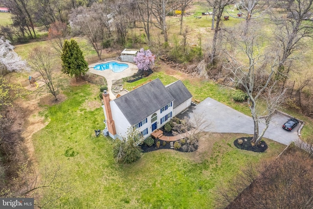 view of subject property featuring a pool area