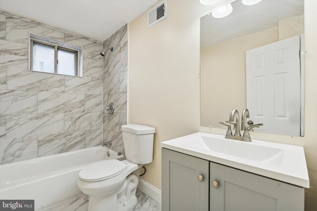 1611 N Cadwallader St, Philadelphia, PA 19122 - full bathroom with vanity, marble finish floors, washtub / shower combination, toilet, and baseboards
