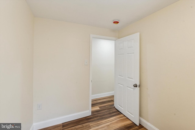 1611 N Cadwallader St, Philadelphia, PA 19122 - unfurnished room with baseboards, wood finished floors, and a smoke detector