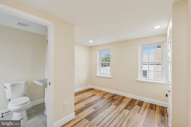 1611 N Cadwallader St, Philadelphia, PA 19122 - unfurnished room with wood finished floors, baseboards, and recessed lighting