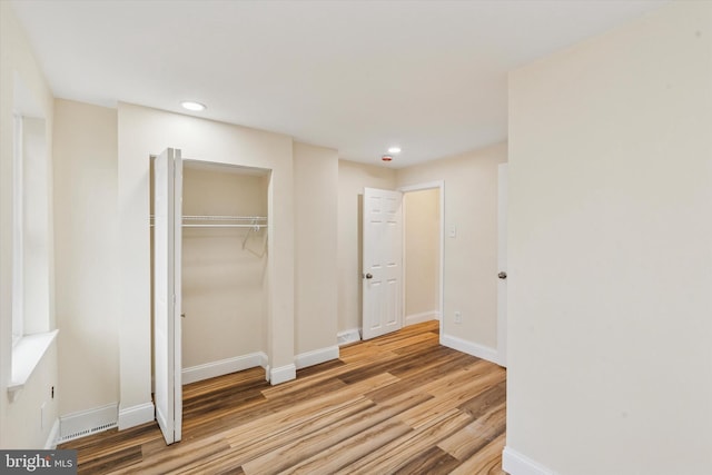 1611 N Cadwallader St, Philadelphia, PA 19122 - unfurnished bedroom featuring wood finished floors, recessed lighting, baseboards, and a closet
