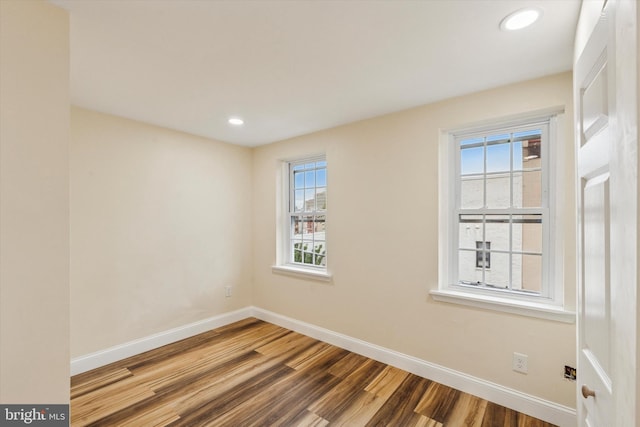 1611 N Cadwallader St, Philadelphia, PA 19122 - spare room featuring wood finished floors, baseboards, plenty of natural light, and recessed lighting